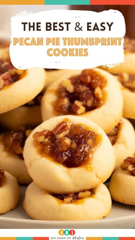 Discover the joy of baking with these Pecan Pie Thumbprint Cookies! A delightful combination of soft, buttery cookie dough and a luscious pecan pie filling, these cookies are sure to be a hit at any gathering. Perfect for holidays, family events, or just a cozy night in. Easy to make and irresistibly delicious, they bring the essence of pecan pie to your cookie jar. Don't miss out on this sweet adventure – grab the recipe now and start baking your new favorite treat! Thumbprint Cookie Filling Ideas, Pecan Pie Thumbprint Cookies Recipe, Homemade Thumbprint Cookies, Thumbprint Cookies Recipe Easy, Pecan Pie Shortbread Cookies, Pecan Finger Cookies, Thumbprints Cookies Recipe, Pecan Pie Thumbprint Cookies, Pecan Pie Cookies Easy