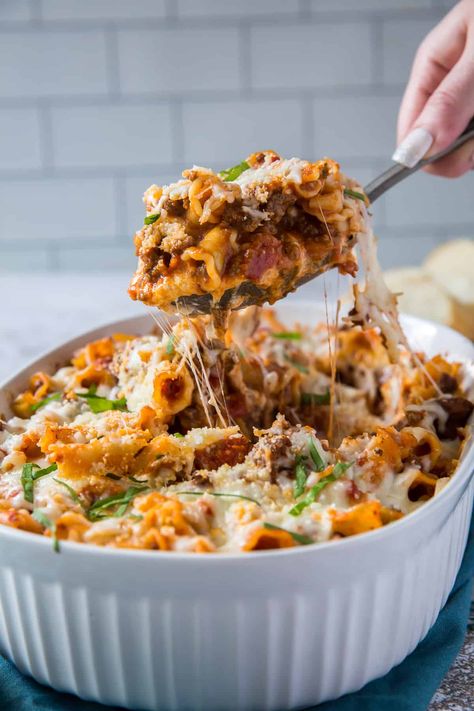 This Lazy Lasagna Casserole is a no-fuss way to satisfy your craving for lasagna. Bake it after assembling or freeze it for an easy meal on a busy day. #lasagnacasserole #pasta #pastacasserole #lasagna #easydinner #freezermeals Lasagna Recipe Lazy, Lasagna Casserole Recipes Ricotta, Lazy Lasagna Casserole, Cabin Food, Protein Options, Lazy Lasagna, Easy Baked Ziti, Italian Stallion, Lasagna Casserole