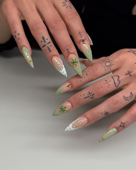 Imnotperfectbutmynailsare | @mystic_smoke_robin @mysticsmokeandtrinkets #420 #420nailart #greennails #charmnails #potleafnails #naildone #stillettonails #sagenails… | Instagram 4 20 Nails, Pot Leaf Nails, Nails Hippie, Hippie Nail Art, Hippie Nails, Set Ideas, Nail Idea, April 15, Fancy Nails