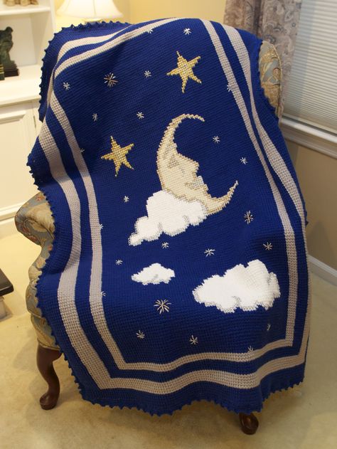 This is a picture blanket I made as a gift.   I  call it Celestial Sleep.  Stars, moon and clouds on this one of a kind crochet creation.  The base stitch is a tunisian stitch, also known as afghan stitch.  This afghan won a GRAND PRIZE in a district level Woman's Club competition and GRAND prize again in the State-wide competition at the Golden Nugget in Atlantic City in May, 2015.  Nice memory!  Designed and crocheted by Grace Cardiello. Free Crochet Baby Blanket Patterns, Crochet Baby Blanket Patterns, Baby Blanket Patterns, Moon And Clouds, Afghan Stitch, Fast Crochet, Picture Blanket, Golden Nugget, Crochet Bag Tutorials