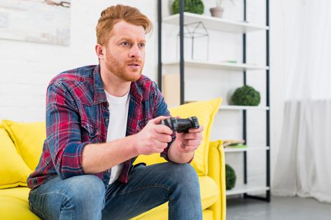 Person Playing Video Games Reference, Funny Engagement Pictures, Formal Hair, Yellow Sofa, App Landing Page, Man Sitting, Video Gamer, Young Couple, Boys Playing