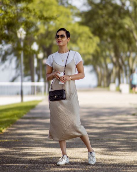 Slip Dress Outfit Fall, Dress With Shirt Underneath, Slip Dress Street Style, Grace Byers, Gold Slip Dress, Silk Dresses Outfit, Dress And Sneakers Outfit, Slip Dress Outfit, Summer Slip Dress