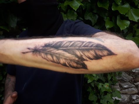 Mens Feather Tattoo Forearm, 2 Feathers Tattoo Design, Men’s Feather Tattoo, Feather Tattoo Men Forearm, Red Tail Hawk Feather Tattoo, Country Tattoos For Men Forearm, Mens Feather Tattoo, Feather Tattoo Sleeve, Western Feather Tattoo