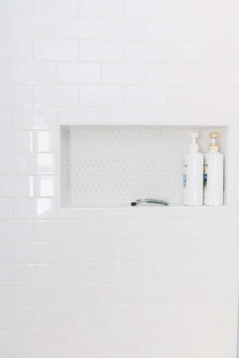 All White Tile Bathroom, Penny Tile And Subway Tile Bathroom, White Subway Tile Wainscoting Bathroom, White Tile Bathroom Floor Ideas, Classic Subway Tile Bathroom, Large White Subway Tile Bathroom, White Subway Tile Bathroom Vertical Stack, Marble And White Subway Tile Bathroom, White Tile Shower Floor