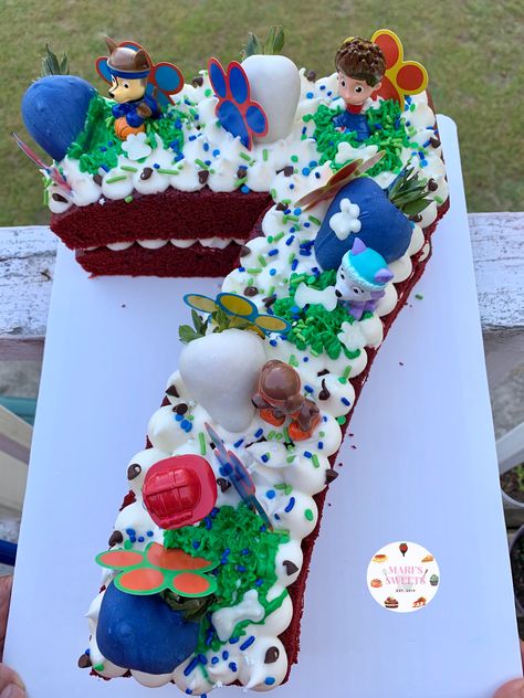 Red velvet paw patrol themed number 7 cake #numbercake #pawpatrol Paw Patrol Number Cake, Easy Paw Patrol Cake, Number 7 Cake, Paw Patrol Party Cake, Paw Patrol Torte, Easy Kids Birthday Cakes, Monogram Cupcakes, Number 1 Cake, Cake Minecraft