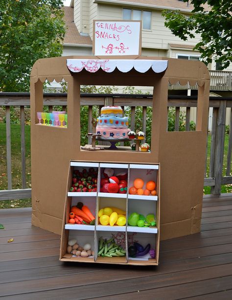 I'm still procrastinating, you guys. So last night I thought I'd play with cardboard - the grandest way I know to avoid sewing things I'm ... Cardboard Forts, Carton Diy, Kids Market, Ikat Bag, Cardboard Box Crafts, Cardboard Toys, Diy Cardboard, Dramatic Play, Kid Crafts