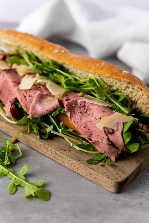 Upgrade your lunch game with this truffle roast beef sandwich. Juicy beef, savory truffle aioli and crusty bread make for a satisfying bite. Romantic Picnic Food, Truffle Aioli, Roast Beef Sandwich Recipes, Rare Roast Beef, Best Roast Beef, Beef Sandwich Recipes, Quick Sandwiches, Red Roots, Leftover Roast Beef