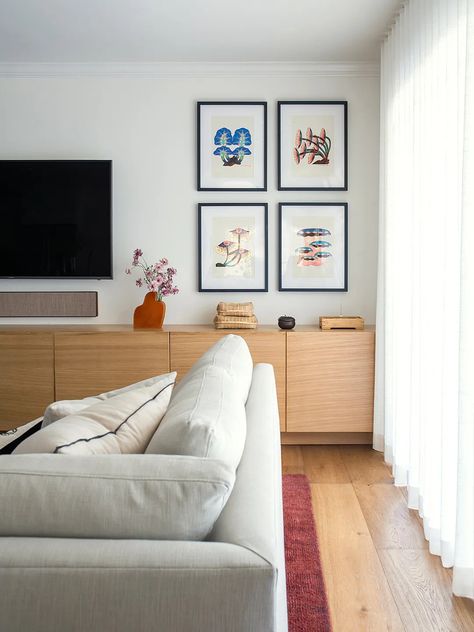 Hallway Tv Room, Large Art On Wall, Narrow Media Room, Floating Couch In Living Room Layout, Frame Tv Living Room Ideas, Colorful Scandinavian Living Room, Long Wall In Living Room, Living Room Side Wall, Tv Small Living Room