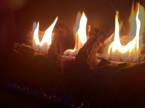 How to make a fake fire for a faux fireplace Diy Fake Flames Faux Fireplace, Faux Fireplace Lights, Faux Fire In Fireplace, Fake Flames For Fireplace, How To Make A Fake Fireplace Look Real, How To Make A Fake Fire, Fake Fire For Fireplace, How To Make A Faux Fireplace, Fake Fireplace Wall Ideas