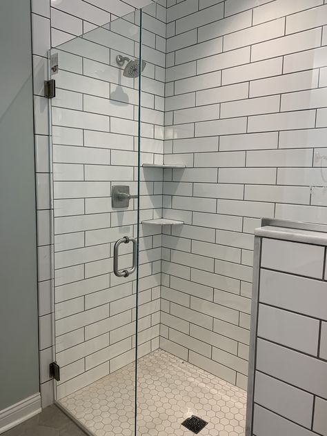 Hexagon Bathroom Floor, Hexagon Flooring, Marble Shelves, White Subway Tile Shower, White Subway Tile Bathroom, White Tile Shower, Subway Tile Showers, Hexagon Tile Floor, Bath Tile