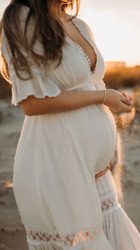 Galveston maternity session Maternity Photos White Dress, White Maternity Dress Photo Shoots, White Dress Maternity Shoot, Tan Dress Maternity Photos, Coastal Maternity Shoot, Neutral Maternity Pictures Beach, White Maternity Dress Photo Shoots Beach, White Sands Maternity Shoot, White Dress Beach Maternity Shoot