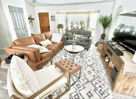 Adorable leather and aztec design Great Room Layout With Dining, Family Room Styling, Tv Couch Layout, How To Style A Long Living Room, Living Room 2 Couches Layout, Off Center Living Room, Off Set Fireplace Living Room, Living Room Layouts With Tv, Long Family Room Layout With Tv