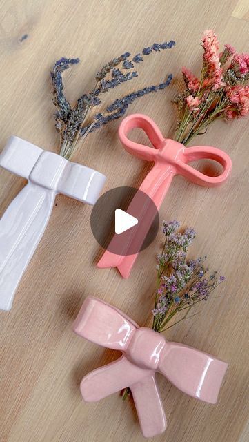 Alice Lee on Instagram: "I made these ceramic bow wall vases! 🎀🌸 this video is an ode to the random ideas that strike you at 9 PM that you then get hooked on and stay up all night to get done the day before your guests arrive for Thanksgiving :) These bow vases have a built in mount in the back so they can be installed on the wall, as well as two holes that hold a small bunch of dried flowers! This year I started drying flowers in my room — from my garden and from old bouquets (@diosablooms 💕). So it’s lovely to get to repurpose these flowers and see them in bloom everyday in my kitchen now! I had thought that I wanted to take a short break + not touch clay for the rest of the year (reasons: it’s a long drying process, very messy, other stuff to do, etc). But then when I found myself st Ceramic Wall Vase, Bow Vase, Bow Clay, Alice Lee, Drying Flowers, Stay Up All Night, Bow Wall, Wall Vases, Modelling Clay