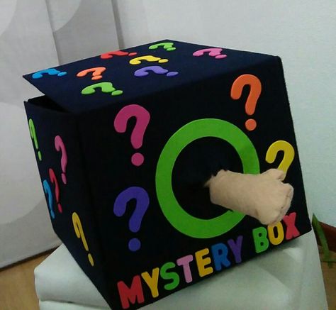 Mystery box Mystery Box Preschool, Diy Mystery Box Ideas, Mystery Box Ideas For Kids, Mystery Box For Kids, Disney Halloween Diy, Mystery Box Ideas, Homemade Baby Toys, Preschool Designs, School Art Activities