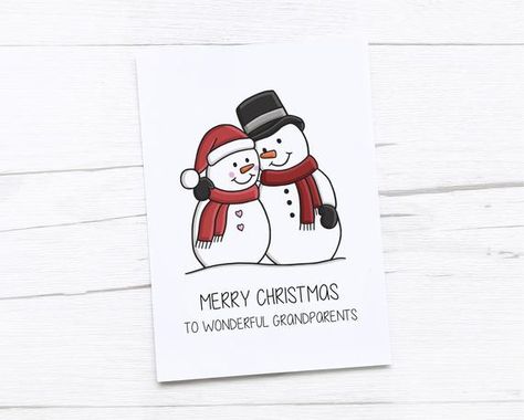 This cute, illustrated card is perfect for Christmas this year for your GrandparentsThe design is printed on 250gsm premium quality craft card, with a smooth finish. The card measures 105 x 148mm (A6) and comes with a white 100gsm envelope. The card is also blank inside for you to write your own personal message. This product will arrive packed in a clear bio-degradable / compostable sleeve, within a sturdy envelope to ensure it reaches you in perfect condition. All post is sent with a First Cla Christmas Card Ideas For Grandparents, Diy Christmas Cards For Grandparents, Christmas Card For Grandparents, Christmas Cards For Grandparents, Christmas Cards For Parents, Christmas Cards Snowman, Christmas Congratulations, Snowman Christmas Card, Christmas Cards Drawing