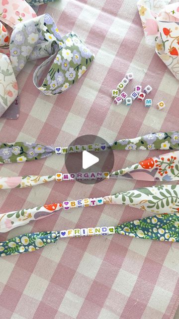 Aurelie Erikson on Instagram: "DIY fabric bracelets, aka concert bracelets 🎀   It’s officially concert season, so grab your girlfriends because girls' night just got a whole lot more fun! Everyone will LOVE making these bracelets! 🌼🌸  Tip *cut fabric strips in half down the center   everything I used is 🔗 in my Amazon store front in bio!  save & share with a friend 🫶🏼 . . . . . . . #summercrafts #diybracelet #friendshipgoals #craftylife #craftygirl #girlsnight #summercrafts #diycrafts #tutorial #morganwallen #concertseason" Fabric Scrap Bracelet, Diy Fabric Bracelets Tutorials, Fabric Beaded Bracelets, Fabric Friendship Bracelets Diy, Diy Fabric Bracelets, Fabric Friendship Bracelets, Concert Bracelet Ideas, Bead Crafts To Sell, Girls Night Diy Crafts