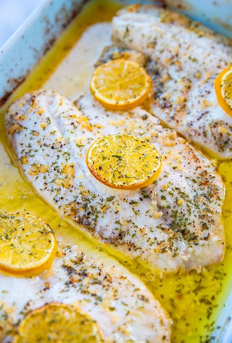 Poached Tilapia, Lemon Garlic Tilapia, Baked Tilapia Fillets, Poached Fish Recipes, Breaded Fish Recipe, Poached Fish, Tilapia Recipe, Lemon Garlic Sauce, Tilapia Recipes