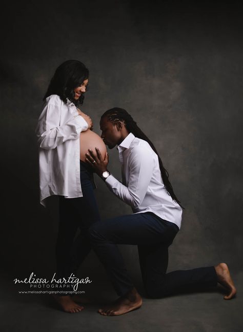 expectant mom and dad studio maternity session dad kissing baby bump Dad Kissing Baby Bump, Baby Bump Shoot Ideas, Mom And Dad Maternity Shoot, Couple Maternity Pictures Studio, Studio Maternity Shoot Couple, Photoshoot Poses Studio, In Studio Maternity Session, Pregnancy Photoshoot Poses, Studio Maternity Shoot