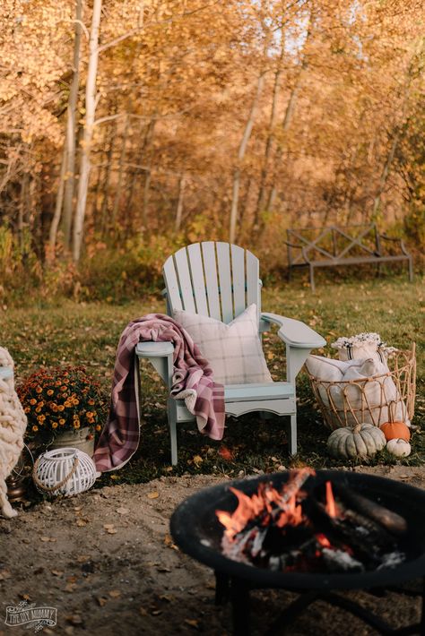 Cozy bakyard fire pit area with DIY Muskoka chairs, upcycled fire pit, s'mores station and cozy textiles for Fall Bonfire Party Ideas Backyard, Upcycled Fire Pit, Bonfire Party Ideas, Backyard Redesign, Muskoka Chairs, Fall Backyard, Cozy Textiles, Muskoka Chair, Ohio House