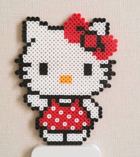 Hello Kitty perler beads by joyeuny Hello Kitty Template, Animate Tutorial, Kitty Template, Kitty Perler Beads, Hello Kitty Perler Beads, Pixel Beads, Pearl Beads Pattern, Easy Perler Beads Ideas, Beads Patterns