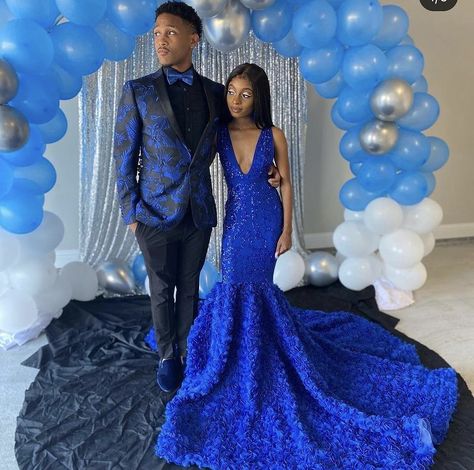 Blue Prom Couple Outfits Black, Prom Dresses With Matching Suit, Royal Blue Tuxedo For Men Prom, Black And Blue Prom Suit, Royal Blue Prom Outfits For Couples, Couple Prom Outfits Ideas, Purple And Black Prom Couple, Dark Blue Prom Suit, Navy Blue Prom Suits