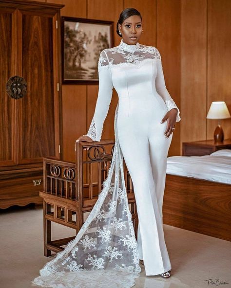 nigerian wedding gallery (@nigerianweddinggallery) posted on Instagram: “We just have to say that bride @steffetb nailed this look! Just look at that. Bride: @steffetb ⁣ Planner: @etaleventsng ⁣ Bridal styling:…” • Sep 10, 2020 at 2:17am UTC Bridal Jumpsuit With Train, Reception Jumpsuit, Designer Overalls, Jumpsuit Wedding Dress, White Jumpsuit Wedding, Jumpsuit Wedding, Camo Wedding Dresses, Bride Jumpsuit, Bride Reception Dresses