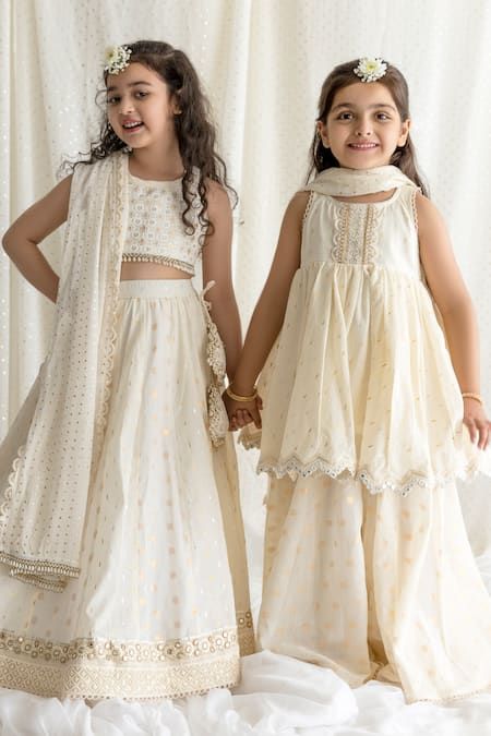 Buy Ivory Cotton Lining Mulmul Embroidered Thread Work And Sequin Lehenga Set For Girls by Chotibuti Online at Aza Fashions. Indian Dresses For Kids, Sequin Lehenga, Kids Indian Wear, Hand Embroidered Dress, Ethnic Wear Indian, Desi Dress, Kids Ethnic Wear, Wedding Dresses For Kids, Lehenga Designs Simple