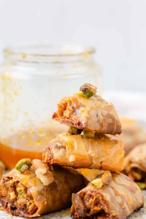 Easy traditional Greek rolled baklava bites! Homemade from scratch with honey, walnuts and phyllo dough. Learn how to make with step by step instructions! Rolled Baklava, Baklava Bites, Baklava Rolls, Honey Walnuts, Phyllo Dough Recipes, Dough Recipes, Phyllo Dough, Dough Recipe, Baklava