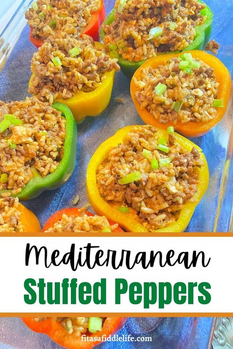 A twist on traditional Italian stuffed peppers. Made with ground turkey, brown rice, and Mediterranean flavors. They are tasty and filling. fitasafiddlelife.com Medditeranean Stuffed Peppers, Mediterranean Diet Stuffed Peppers, Mediterranean Diet Recipes Stuffed Peppers, Mediterranean Diet Recipes With Ground Turkey, Stuffed Peppers With Brown Rice, Mediterranean Diet Ground Turkey Recipes, Stuffed Green Peppers With Ground Turkey, Ground Turkey Recipes Mediterranean, Mediterranean Ground Turkey Recipes