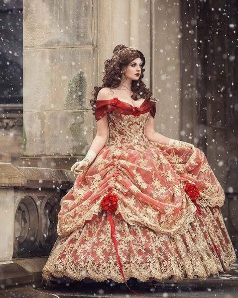 Love this shoot of our upscale red and gold Belle Beauty and the Beast gown!  Done by @bernadettenewberry model @aitenshimisha down in photos is on sale in our Etsy shop, but this can be ordered in other colors and sizes at regular price. #belle #Bellegown #beautyandthebeastwedding  #belleweddinggown #goldgown #ballgown  #victoriangown #victorianwedding #snowyday Beauty And The Beast Wedding Dresses, Belle Gown, Beauty And The Beast Wedding, Beauty And Beast Wedding, Belle Beauty And The Beast, Gold Gown, Princess Cosplay, Fantasy Dresses, Disney Cosplay