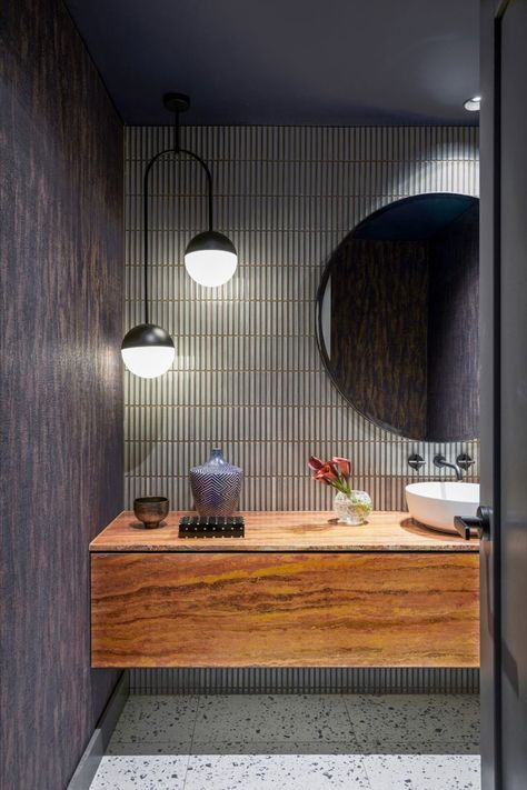 Powder room - the clients love of red travertine was the jumping off point for the materials palette for the entire home balanced here with cool greys and bronze. Our custom lighting "Holophane Pendant" in black completes the space. Powder Room Pendant Lighting, Powder Room Pendant, Bathroom Pendant Light, Modern Mosaic Tile, Contemporary Powder Room, Wooden Bathroom Vanity, Backsplash Patterns, Modern Mosaics, Powder Room Design