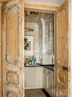 This appears ot be a bar area, but I'm putting it under pantries because I'd never have a bar. House Tour: Lovely Lakeside - Design Chic Design Chic Design Chic Refrigerator Wall With Cabinets, Bar Millwork, Alcove Bar, Hooper House, Ashley Gilbreath Interiors, Ashley Gilbreath, Pantry Bar, Columbia House, House Pantry