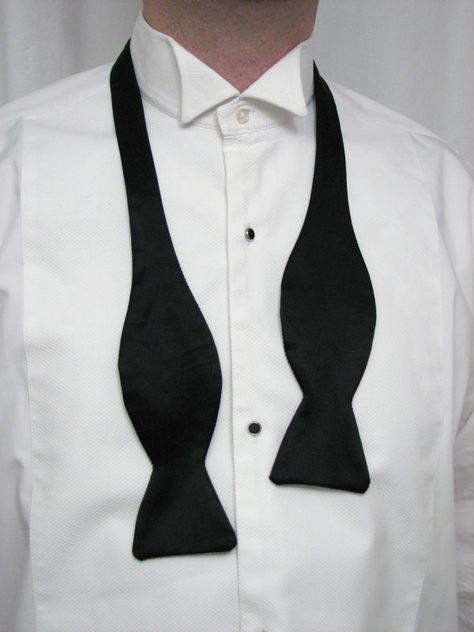 Classic bow tie - undone Tie A Bow Tie, Untied Bow Tie, Wing Collar Shirt, Black Tie Tuxedo, Black Tie Dress Code, Stylish Men Wear, Black And White Tuxedo, Black Suit Wedding, Suit Pin