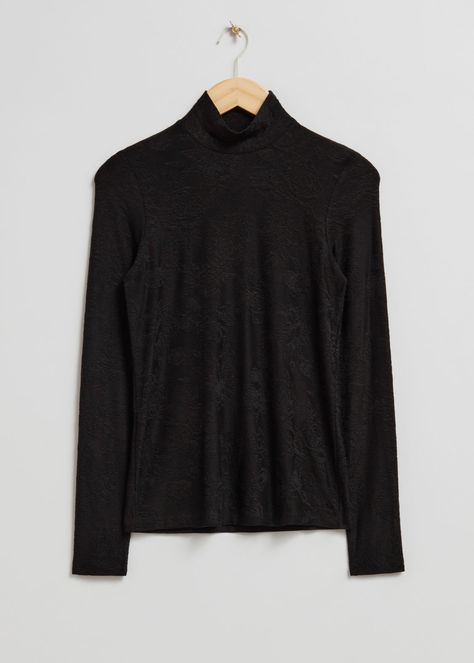 Long-sleeve mock neck top defined by a jacquard finish.Length of top: 60cm / 23.6" (Size S) Jacquard Top, Black Mock Neck, High Neck Top, Black Long Sleeve Top, Mock Neck Top, Fashion Story, Vintage Jeans, Feminine Style, Mock Neck