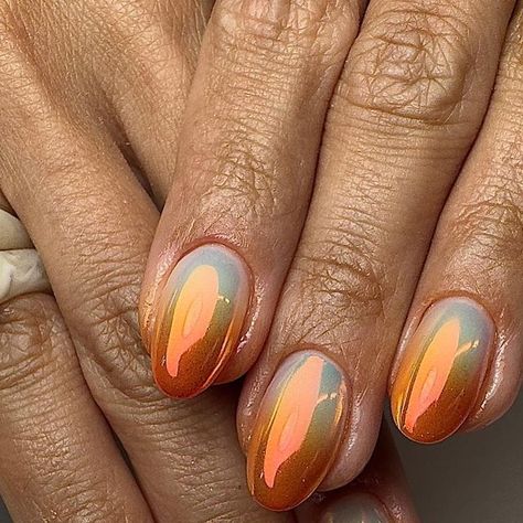 LOLA - NAIL ARTIST & FORMATRICE PARIS on Instagram: "Multipass 🧡🩵 @lesalonlilicreuk @thegelbottlefrance @the_gelbottle_inc @apresnailofficial #chromenails #chrome #airbrush #airbrushnails #nailart #nails #nails2inspire #nailsofinstagram #nailstagram #nailsparis #naturalnails #biab #biabnails #orangenails" Rust Ombre Nails, Multi Color Chrome Nails, Chrome Nails Orange, Nail Trend, Sunset Chrome Nails, Abstract Fall Nails, Chrome Orange Nails, Orange Chrome Nails Designs, Orange Chrome