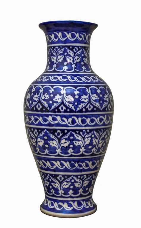 Handmade Craftsmanship: Each clay vase is meticulously crafted by hand, showcasing the artisan's skill and attention to detail. Handmade construction adds a unique and authentic touch to each piece. Intricate Hand-Painted Designs: The vases feature intricate hand-painted designs characteristic of South East Asian blue pottery. These designs often include floral motifs, geometric patterns, or cultural symbols, showcasing the rich artistic heritage of the region. Versatile Decor: These clay vases Types Of Vase, Blue Pottery Vase, Blue Pottery Designs Pattern, Blue Pottery Designs, Clay Vases, South East Asian, Ceramic Flower Vase, Art Appliqué, Painted Designs