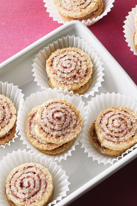 Adorable and sweet, it’s no surprise these Raspberry Almond Pinwheel cookies taste as good as they look. Add a batch to your Christmas cookie spread and watch them disappear! Almond Pinwheel Cookies, Raspberry Pinwheel Cookies, Christmas Pinwheel Cookies, Pinwheel Cookies Recipe, Pinwheels Recipe, Pinwheel Cookies, Pinwheel Recipes, Raspberry Almond, Cookies Baking