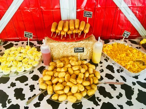 Farm birthday party food table- Lil corn doggies, farm fresh eggs and moo moo mac and cheese Cow Themed Food For Party, Farm Themed Food For Birthday, Farm Party Food Table, Cow Birthday Party Food Ideas, Farm Theme Birthday Party Food, Cow Themed Birthday Party Food Ideas, Barnyard Birthday Activities, My First Rodeo Food Table, 1st Rodeo Birthday Food