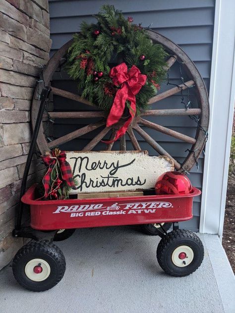 Nana’s Country Christmas | Facebook Christmas Radio, Radio Flyer, Country Christmas Decorations, Porch Christmas Decor, Front Porch Christmas, Cowboy Christmas, Christmas Porch Decor, Christmas Porch, Wagon Wheel