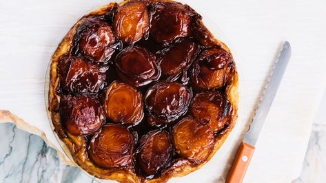 Peach Tarte Tatin Recipe | Bon Appetit Frozen Puff Pastry Recipes, Tarte Tatin Recipe, Peach Tart, Caramel Glaze, Peach Juice, Frozen Puff Pastry, Grilled Peaches, Savory Appetizer, Peach Recipe