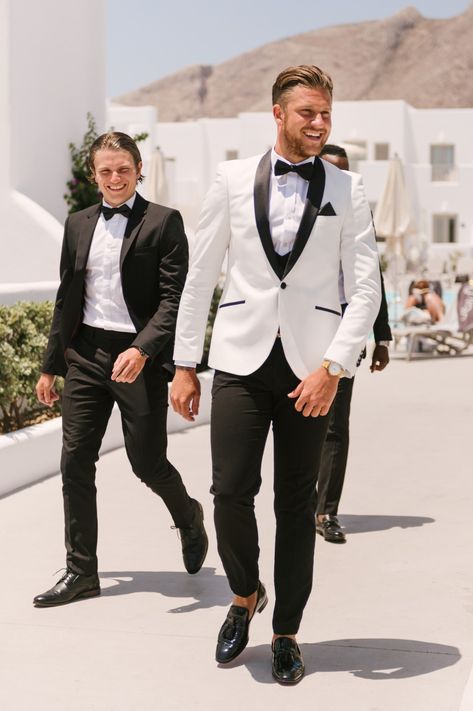 Grooms White And Black Suit, White Suit Groom & Groomsmen Suits, Modern Black Tuxedo Wedding, Black And White Mens Tuxedo, Men’s Wedding Tuxedo White, Men Tux Wedding, Men Suit For Wedding Groom, White Tux Top Black Pants Men, Groomsmen Black And White Attire