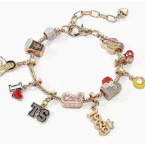 Taylor Swift fan charm bracelet in gold. Taylor Swift Bracelets, Music Bracelet, Swift Bracelets, Charm Bracelet Gold, Luxury Bracelet, Pandora Style, Taylor Swift Fan, Bangle Bracelets With Charms, Glass Bracelet