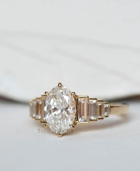 Oval Engagement Ring With Tapered Baguette Side Stones, Oval Baguette Engagement Ring, Baguette Engagement Rings, Oval Art Deco Engagement Ring, Wedding Anniversary Ring, Ring Inspo, Cute Engagement Rings, Future Engagement Rings, Baguette Diamond Rings