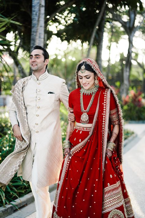 A Gorgeous Seaside Wedding With The Bride Who Wore The Same Lehenga As Deepika Bridal Lehngas Indian, Red Bridal Lehenga Indian, Red Lehenga Bridal, Sabyasachi Lehenga Bridal, Sabyasachi Bridal, Latest Bridal Lehenga, Couple Wedding Dress, Wedding Lehenga Designs, Indian Bride Outfits