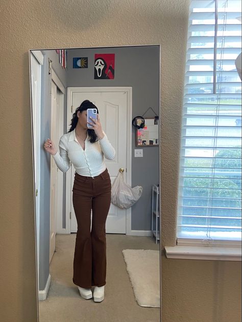 Dark Brown And White Outfit, Brown Dressing Pants Outfit, Flare Business Pants Outfit, Brown Cord Flares Outfit, Flare Pants Outfit Ideas, Styling Brown Flare Pants, Brown Flares Outfit Aesthetic, Brown Flared Leggings Outfit, Casual Brown Flare Jeans