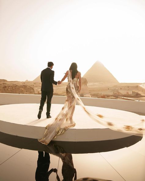 Your Wedding Aesthetics | An epic sunset ceremony right by the majestic Pyramids of Giza, with the Sphinx keeping watch. What location could be more breathtaking to… | Instagram Egyptian Wedding, Wedding Ambiance, H2o Mermaids, Wedding Aesthetics, The Sphinx, Dream Wedding Decorations, The Pyramids, Pyramids Of Giza, Event Planning Design