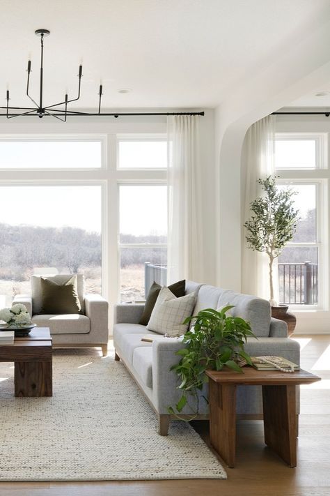 Perfection 👌🏼  _____ Open floor plan living room, full floor-to-ceiling windows, white curtains, modern farmhouse, warm living room, family room, interior design Living Room With Window Wall, Curtains Modern Farmhouse, Family Room Interior Design, Open Floor Plan Living Room, Warm Living Room, Living Room Warm, Nice Ideas, White Windows, Parade Of Homes