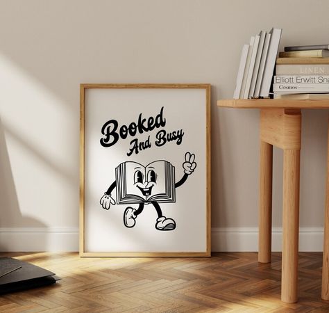 If you're a book lover looking for some mid century design to spruce up your walls this "Booked and busy" book character mascot wall art is the perfect choice! Library Playroom, Book Character Art, Booked And Busy, Reading Poster, Poster Classroom, Wall Art For Nursery, Character Art Design, Preppy Art, Reading Posters