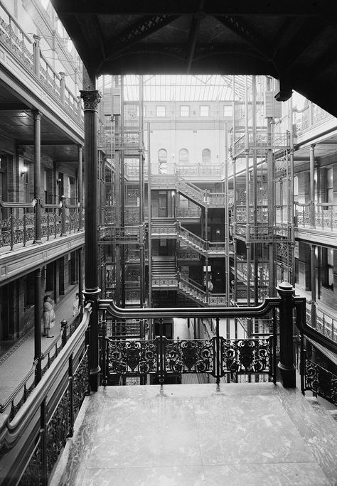 The atrium of the Bradbury Building, Los Angeles, CA, circa 1960. Completed in 1893, aside from being a US National Historic Landmark, it's perhaps best known as a popular film location, most notably for its extensive use in "Blade Runner" and an episode of the original "Outer Limits" TV series, "Demon with a Glass Hand." Bradbury Building, Tyrell Corporation, Outer Limits, Old Commercials, Architecture Landmark, Balcony Railing, Building Facade, House Museum, Italian Marble