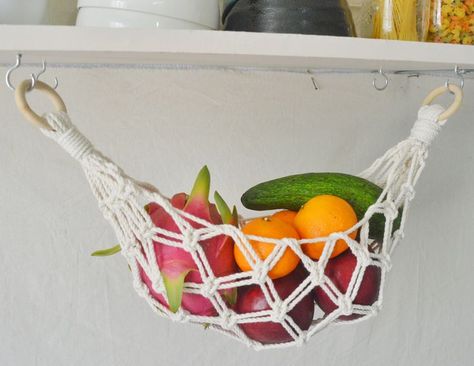 “Home isn’t a place, its a feeling” Cecelia Ahern. Our lovely Macrame Hammock will surely light up your home. Get 2 for only $15.97. All handmade #undercabinet #fruitbasket #hangingfruitbasket #macramedecor #bohodecor #minimalism #homedecor #kitchendecor Hanging Fruit Hammock, Macrame Fruit Hammock, Fruit Hammock, Hanging Fruit Basket, Macrame Hammock, Diy Hammock, Hanging Fruit Baskets, Macrame Home Decor, Fruit Holder